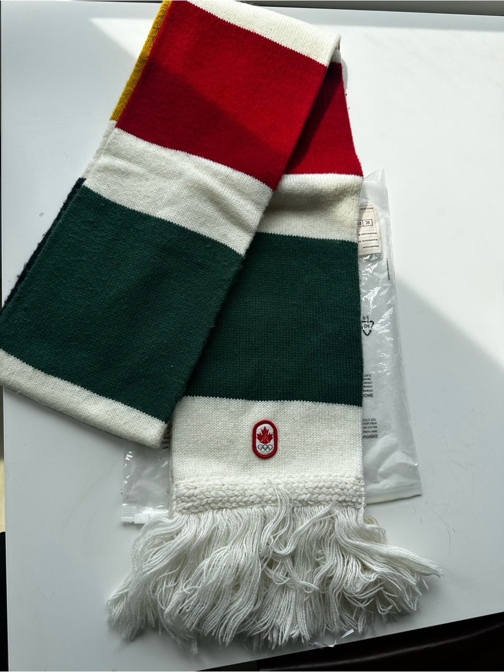 Striped Knit Scarf in Red, Green & White with Crest Accent